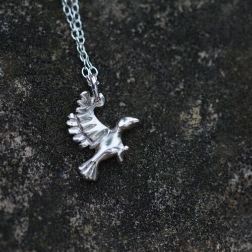 pendentif Columba pendentif représentant une colombe sur une pierre