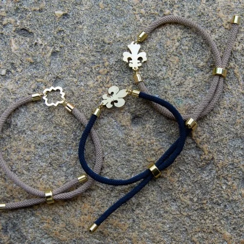 bracelet fleur de lys en laiton et cordon