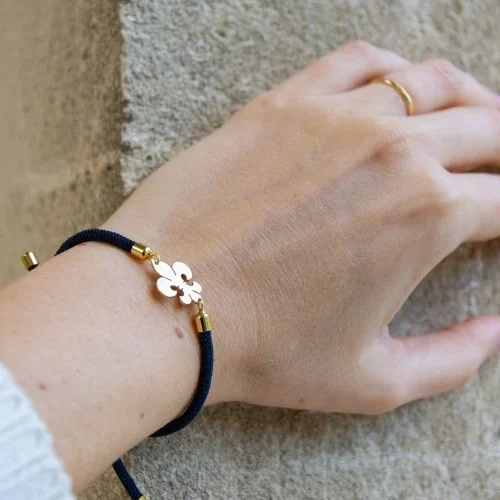 bracelet fleur de lys en laiton et cordon bleu